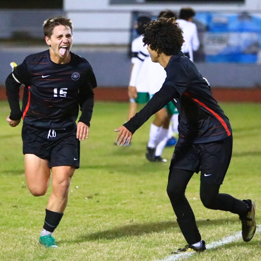 Santa Fe's Wayne Boone (15) celebrates after kicking the game-winning goal against Suwannee in the Class 3A-Region 1 Quarterfinals. Photo by C.J. Gish