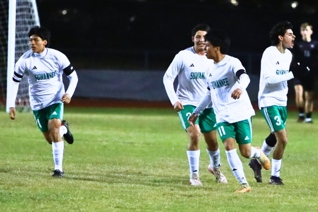 Suwannee celebrates after Rember Alonso's (3) goal tied the game against Santa Fe in the Class 3A-Region 1 Quarterfinals. Photo by C.J. Gish