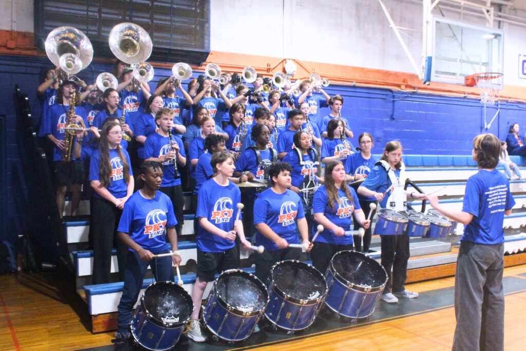 The P.K. Yonge Blue Wave Band and Guard performed before the start of Tuesday's ceremony. Photo by Nick Anschultz