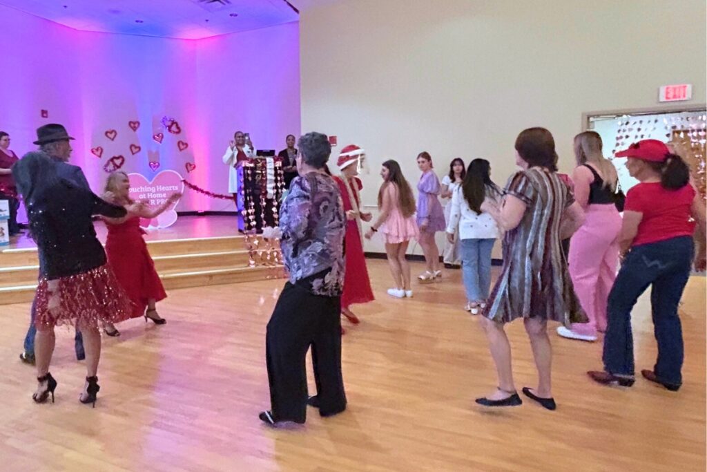 The first Valentine’s Day dance sponsored by Touching Hearts At Home at the senior center. Photo by Ronnie Lovler.