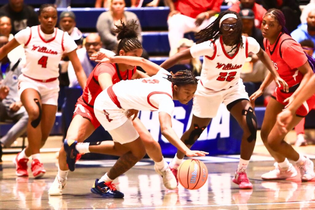 Williston's Ashlyn Young (0) goes for a loose ball against Blountstown in the Rural state semifinals. Photo by C.J. Gish