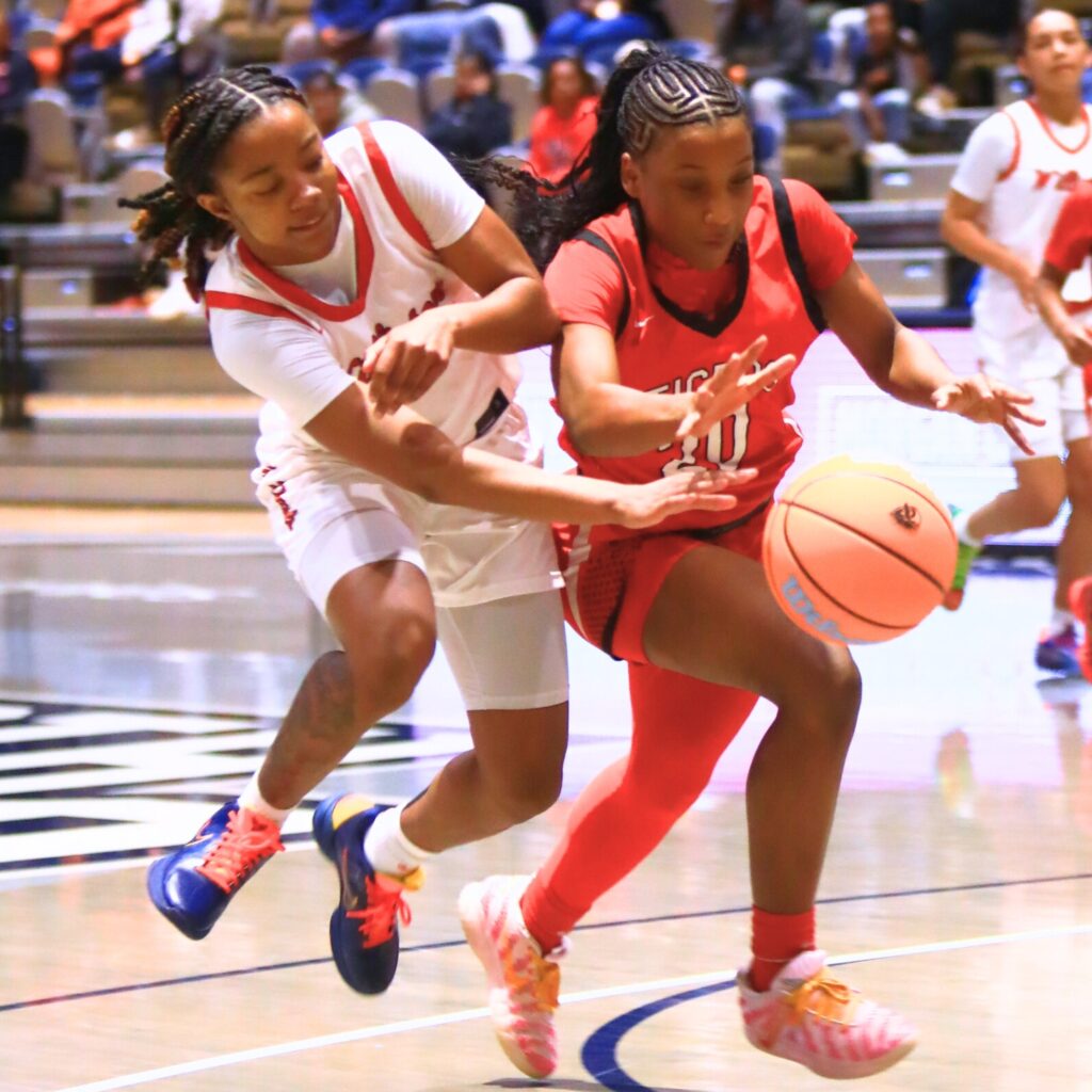 Williston's Ashlyn Young (0) goes for one of her four steals against Blountstown in the Rural state semifinals. Photo by C.J. Gish