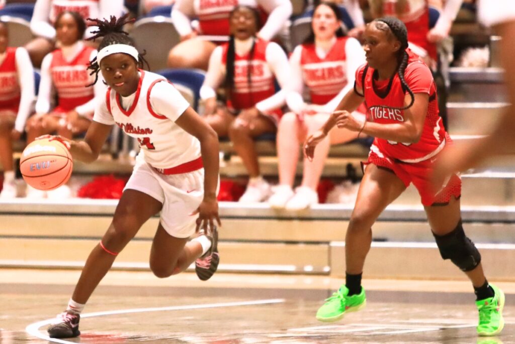 Williston's Janiyah Span (14) brings the ball downcourt against Blountstown in the Rural state semifinals. Photo by C.J. Gish