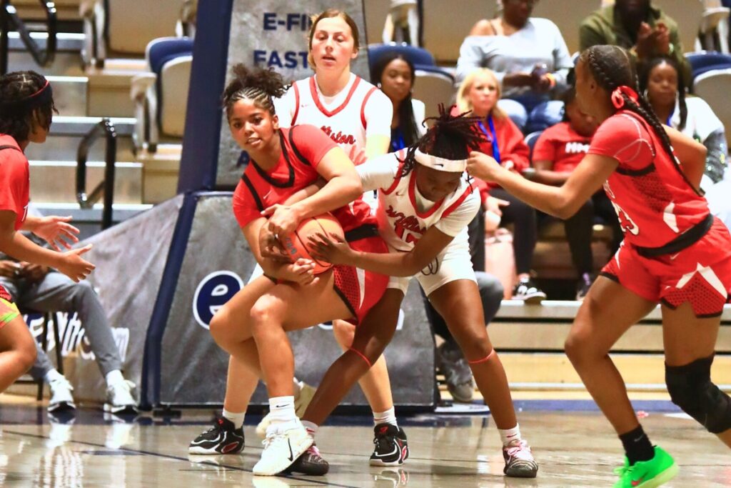 Williston's Janiyah Span (14) forces a jump ball against Blountstown in the Rural state semifinals. Photo by C.J. Gish