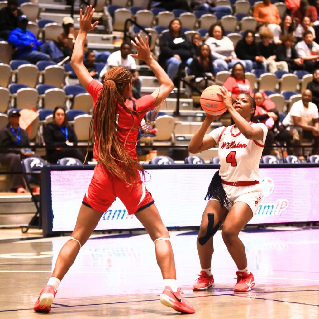 Williston's Tiona Wilkinson (4) puts up a shot against Blountstown in the Rural state semifinals. Photo by C.J. Gish