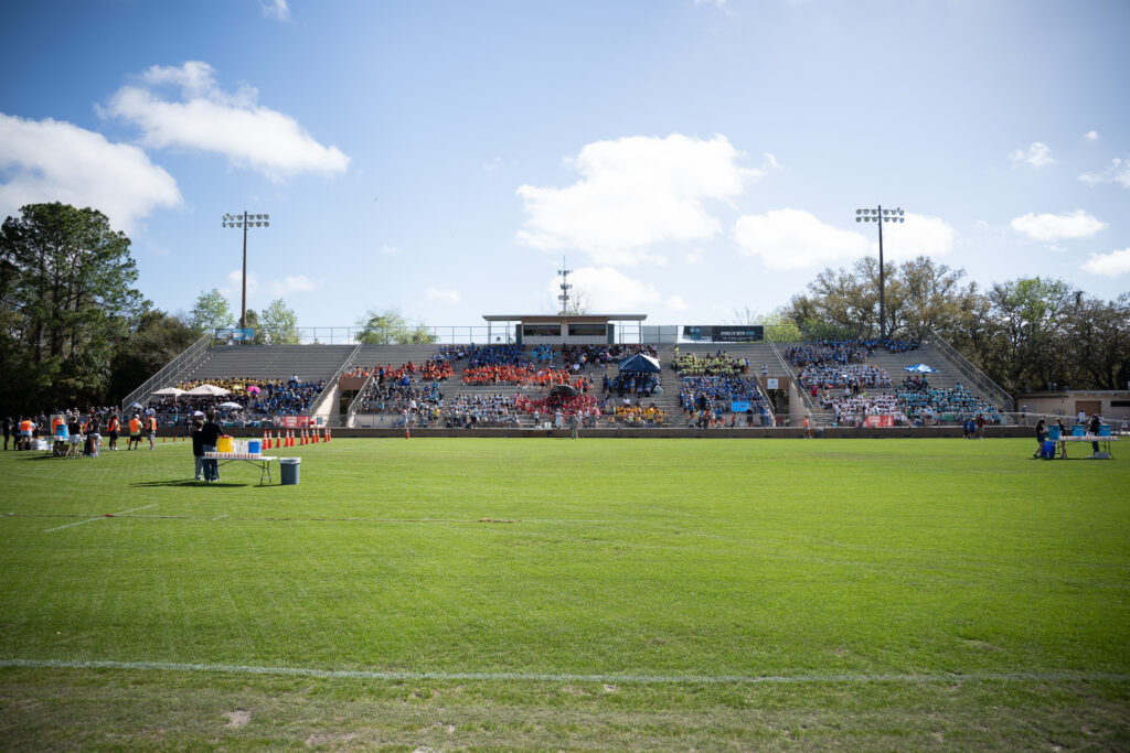 All of the students sitting in the stands at Citizens Field.