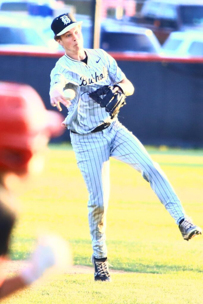 Buchholz's Blake Brewer (7) throws out a Santa Fe batter at first base in the second inning. Photo by C.J. Gish