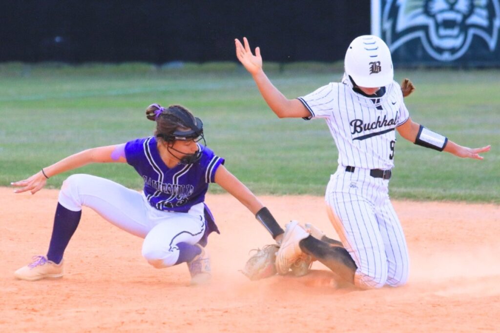 Buchholz's Grace McDaniel steals second against Gainesville. Photo by Seth Johnson