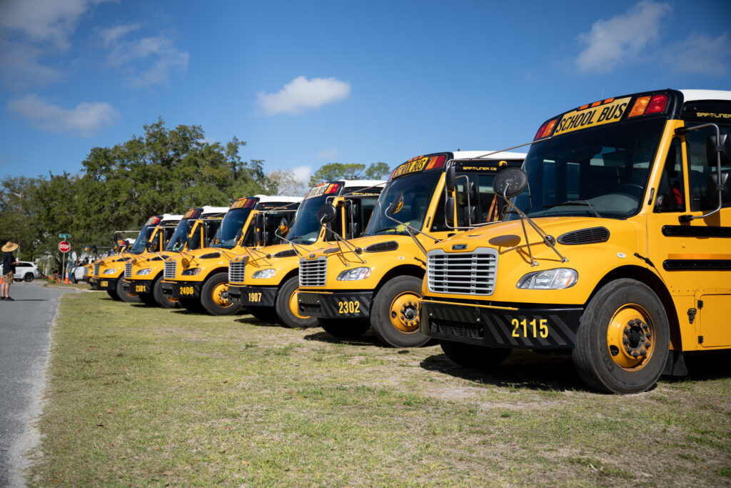 Buses parked in a row after dropping off students at Citizens Field.