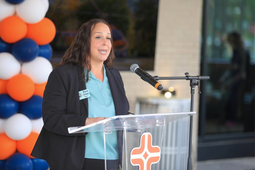 Chiefland Mayor Rissa Johns speaks at the ribbon cutting event for the new air ambulance service.