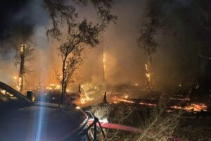 Firefighters contain 2-acre brush fire behind Celebration Pointe