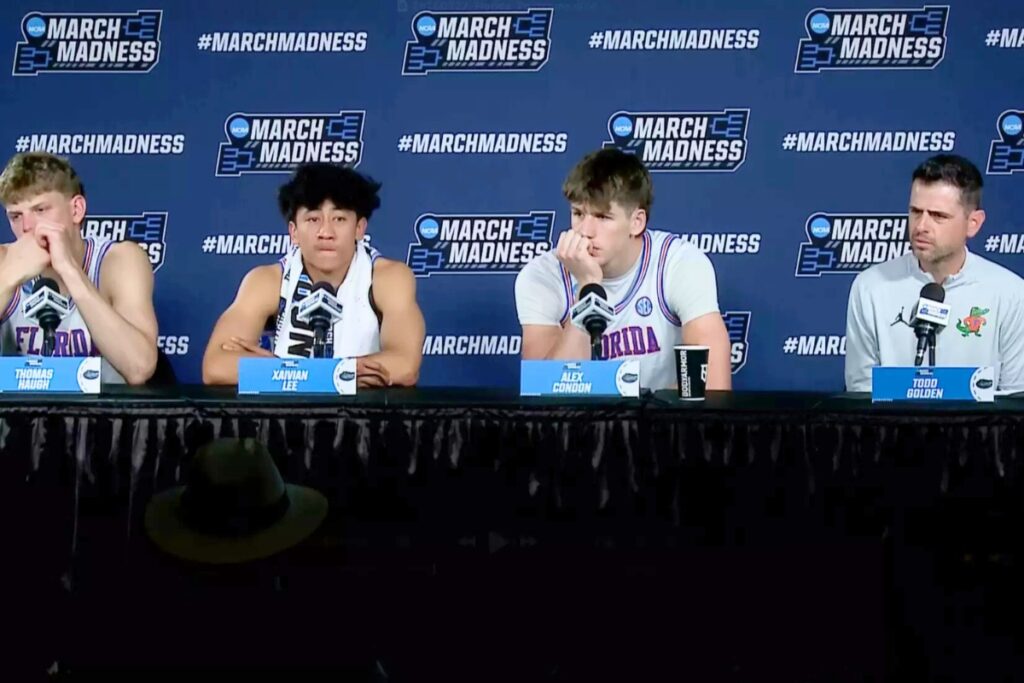 (From left) From left Thomas Haugh, Xaivian Lee, Alex Condon and Coach Todd Golden after Sunday night's loss to Iowa. Courtesy of UAA Communications