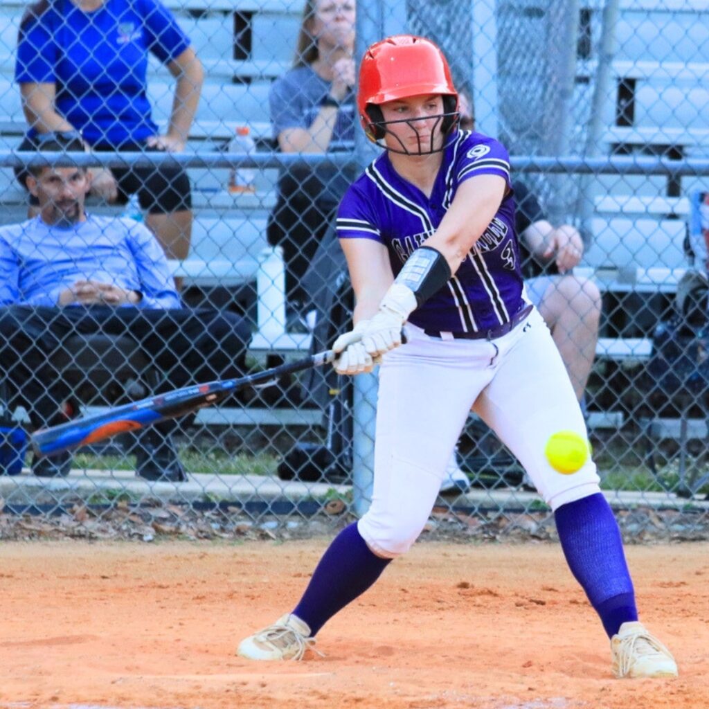 Gainesville's Emma Barton swings at a pitch against Buchholz. Photo by Seth Johnson