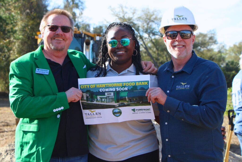 Hawthorne Mayor Jacquelyn Randall (center) said the new resource center proves the City Commission will do what it promises. Photo by Lillian Hamman