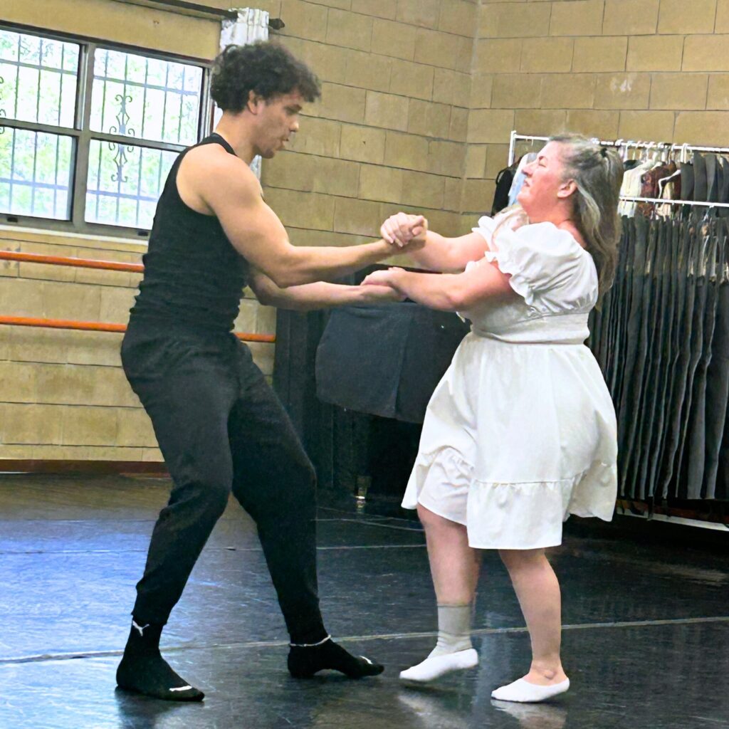 Jorgia Wooten of Crime Prevention Security Systems goes through some steps with her DANB partner, Luan Brito. Photo by Ronnie Lovler
