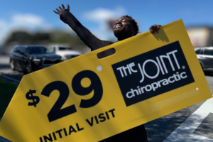 Meet the Archer Road Sign Spinner Helping Gainesville Notice Chiropractic Care