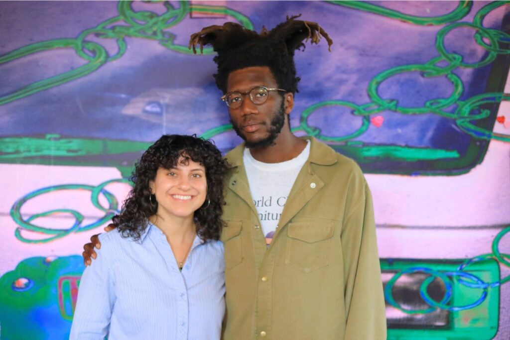 Co-producers Laila Fakhoury and Jahi Khalfani stand together for a photo.