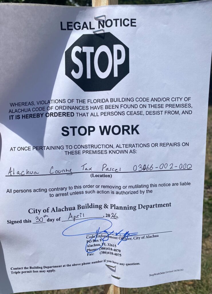 A stop work order from the city of Alachua at Tara Phoenicia for unauthorized land clearing. 