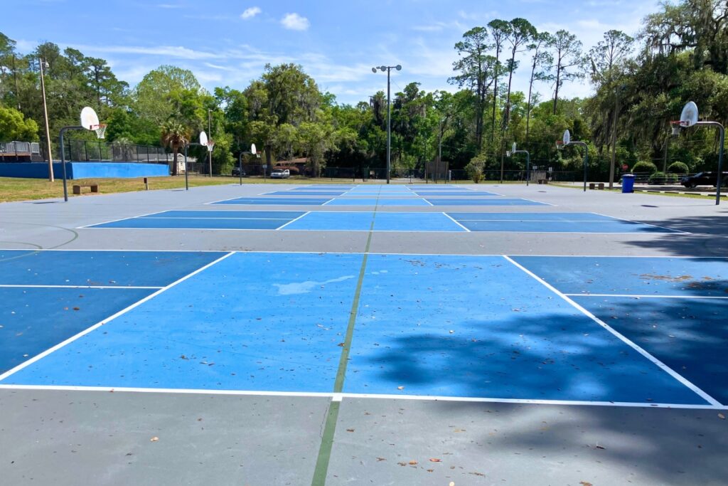 Alachua's Hal Brady Recreation Complex offers six pickleball courts for players to set up nets. Photo by Lillian Hamman