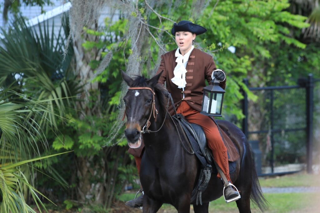 An actress portrays Paul Revere in a Revolutionary War reenactment in Newberry.