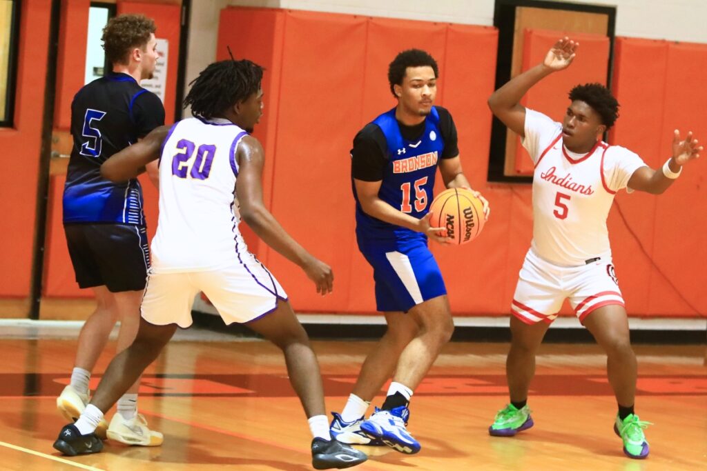 Bronson's Eli Mitchell (15) with a rebound at The Prep Zone All-Star Showcase on Saturday. Photo by C.J. Gish