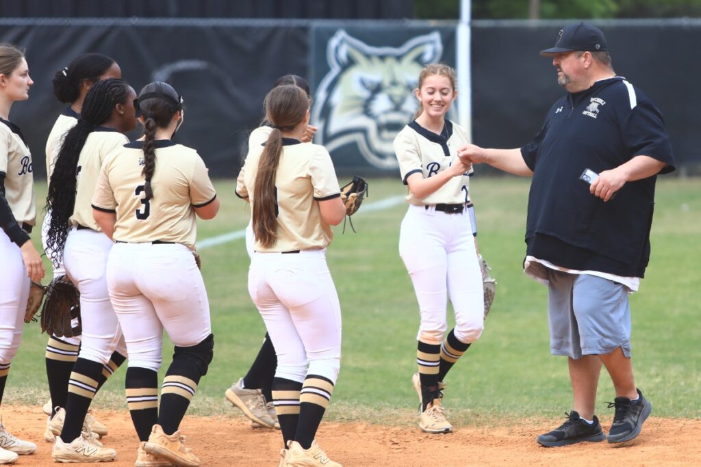 Buchholz coach Will Hooper (right) was named the FACA District 7 Coach of the Year for Class 6A. Photo by C.J. Gish