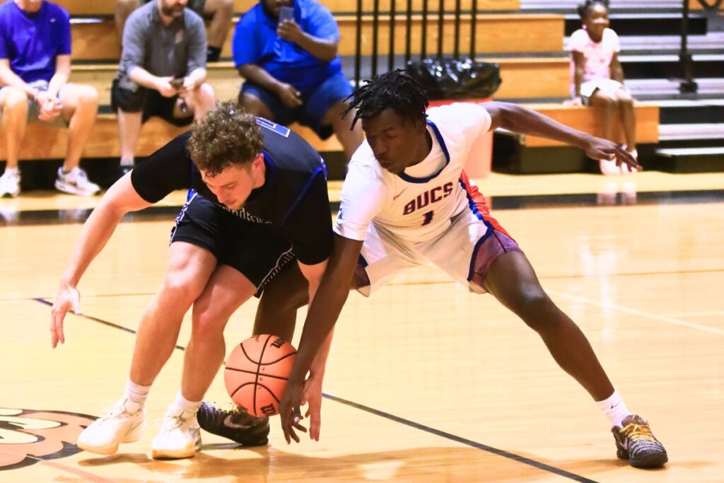 Countyside Christian's Connor Vlaardingerbroek (24) and Branford's Anthony Washington(1) battle for a loose ball at The Prep Zone All-Star Showcase on Saturday. Photo by C.J. Gish