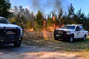 Firefighters battle wildfire off State Road 26 in Alachua County