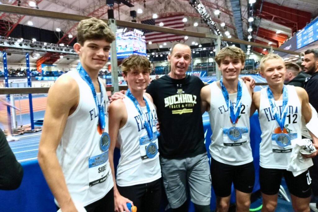 (From left) Buchholz’s Andrew Sides, Davis Garrett, coach Patrick Douma, Quinn Meyer and Samuel Freas. Courtesy of Patrick Douma