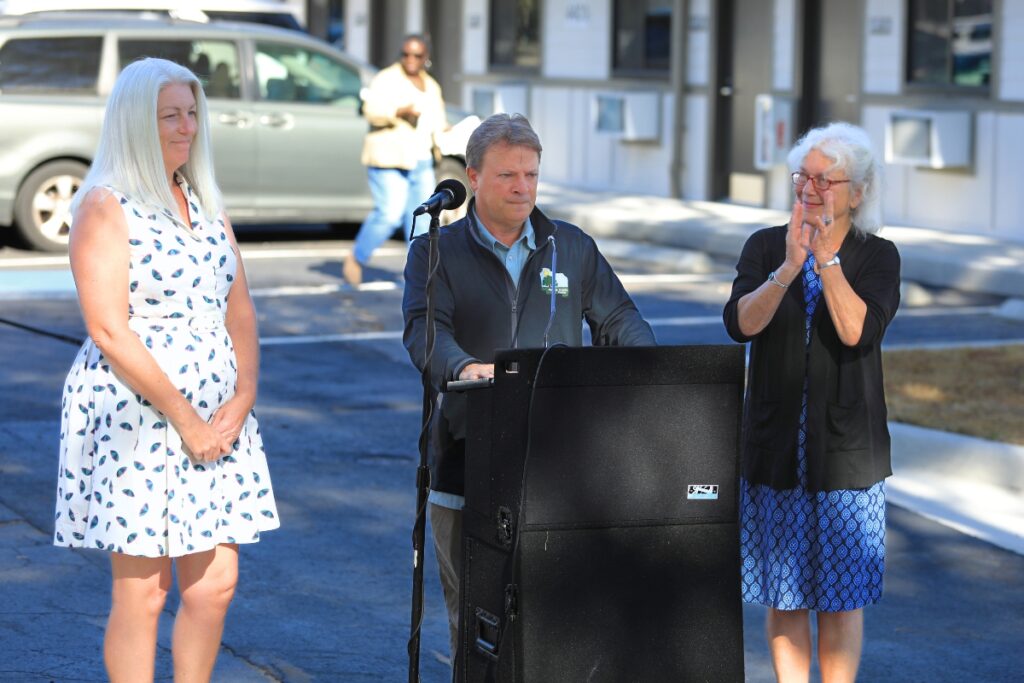 (From left) County Commissioners Anna Prizzia, Ken Cornell and Marihelen Wheeler helped celebrate the opening of Forest Edge and East Tumblin Creek. Photo by Seth Johnson