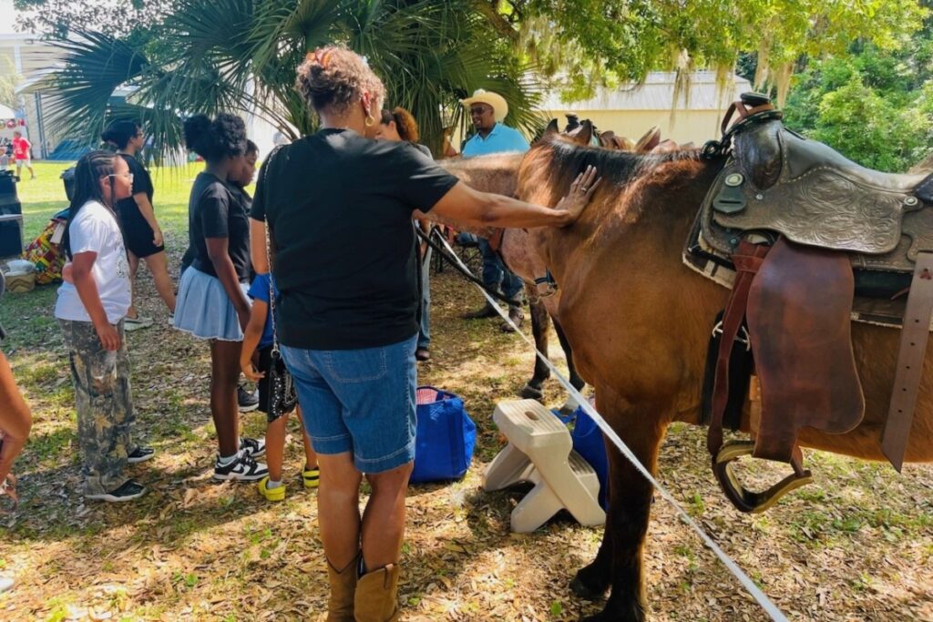 Horse care lessons at the 2025 Black Cowboy/Cowgirl event. 