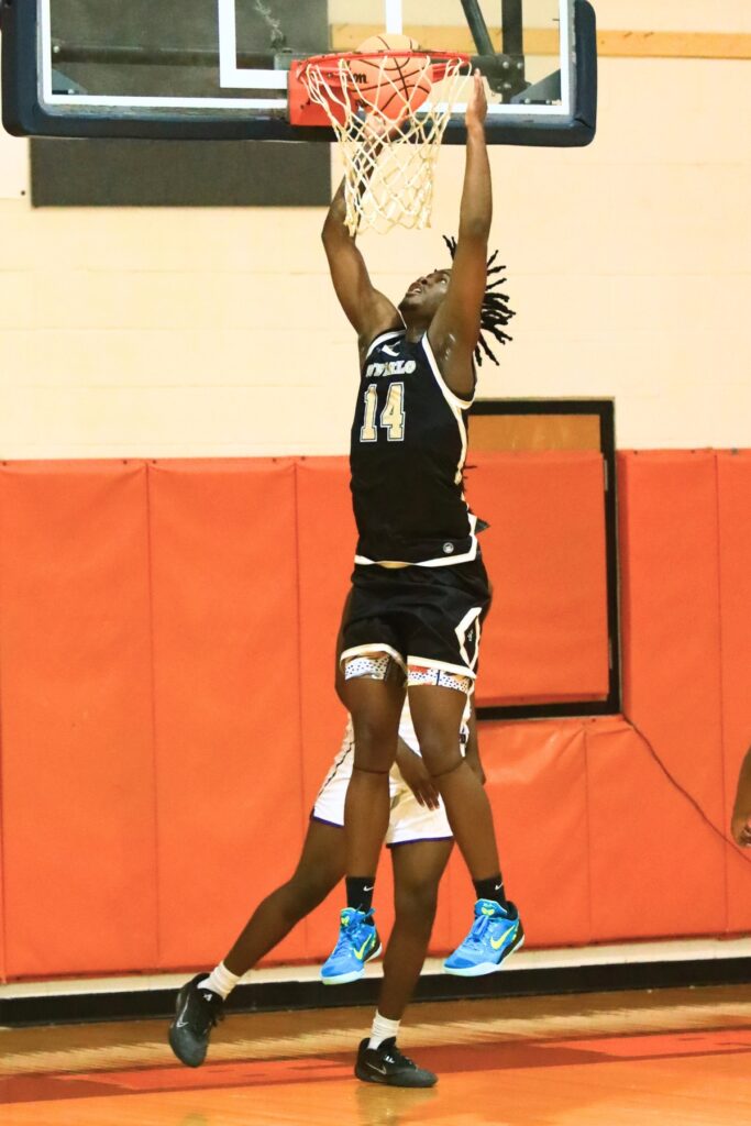 The Villages' Kymani Weathers goes up for a dunk at The Prep Zone All-Star Showcase on Saturday. Photo by C.J. Gish