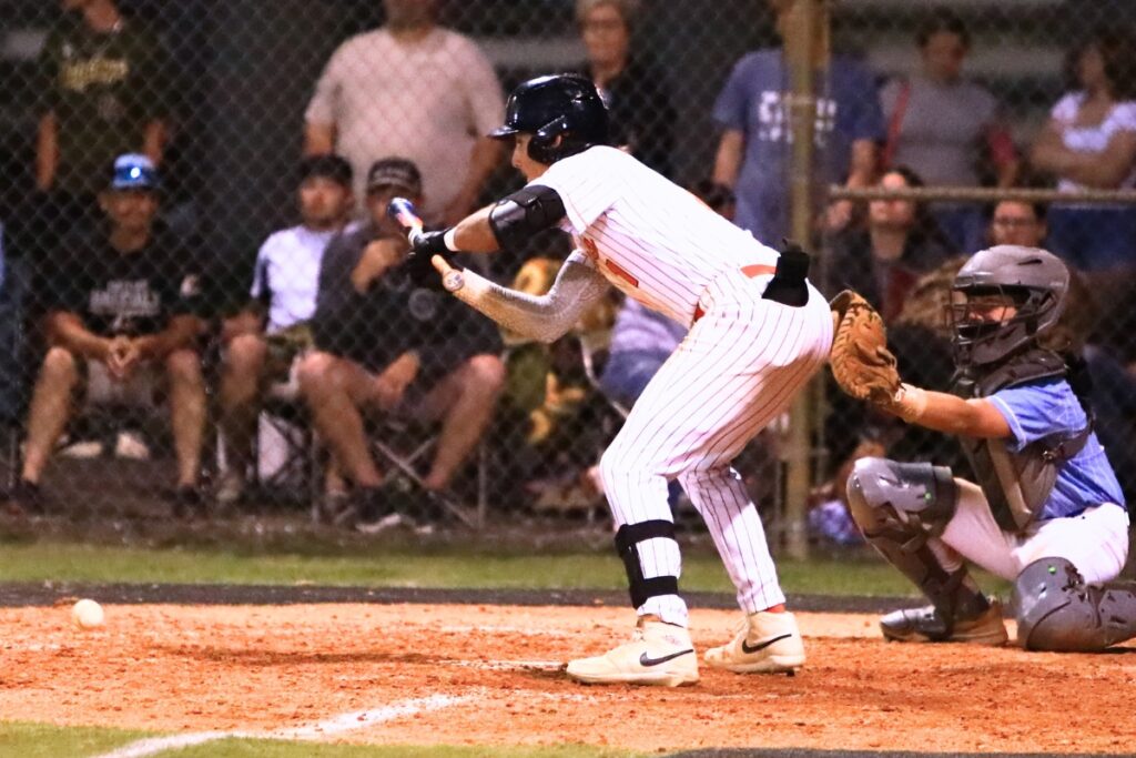 Trenton's Brant Bivens lays down a successful bunt in the bottom of the fifth inning against Chiefland in the Rural-District 7 semifinals. Photo by C.J. Gish