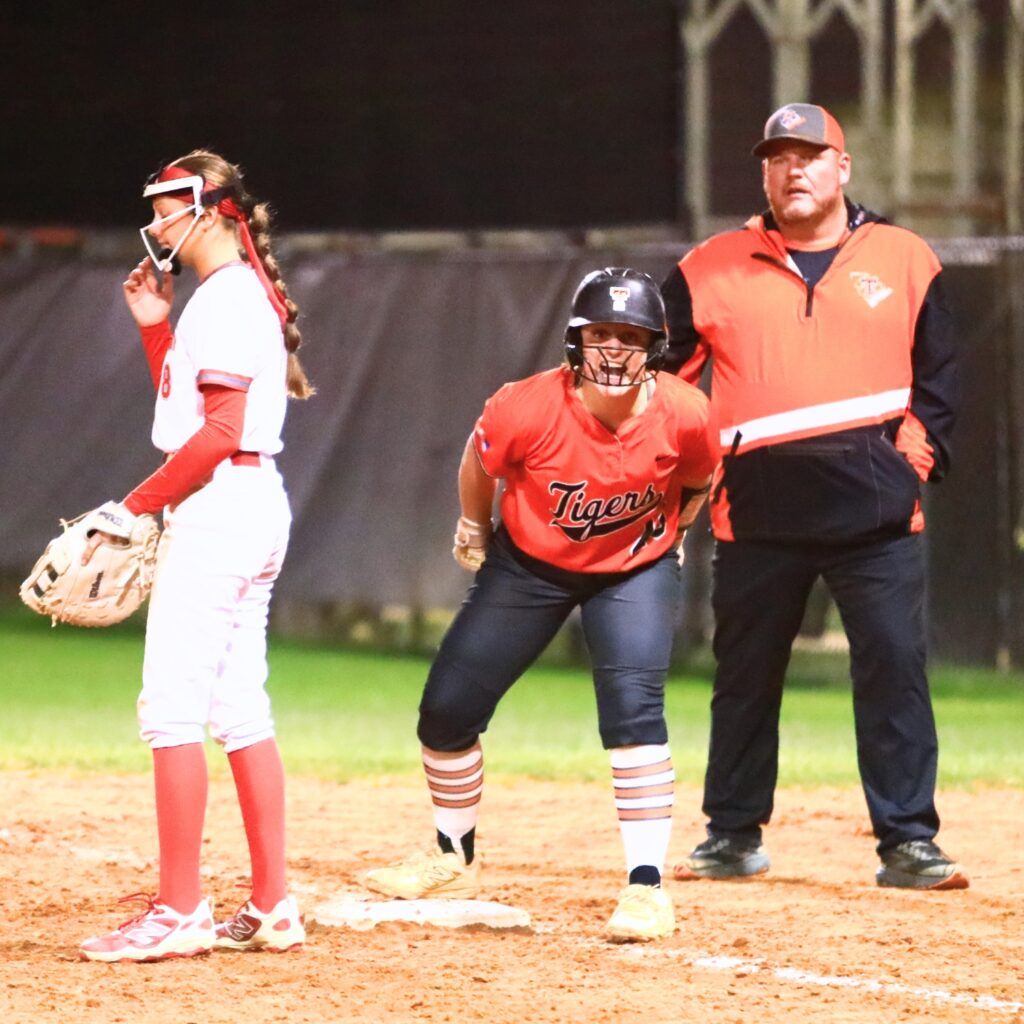 Trenton's Khloe Kirby (28) celebrates after hitting a single in the top of the sixth inning at Santa Fe. Photo by C.J. Gish