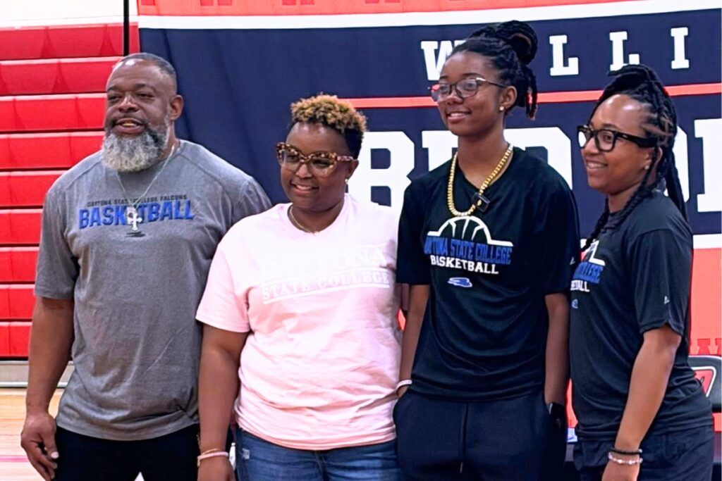 Williston's Ashlyn Young (second from right) signed on April 22 to play college basketball at Daytona State College. Courtesy of Williston High School