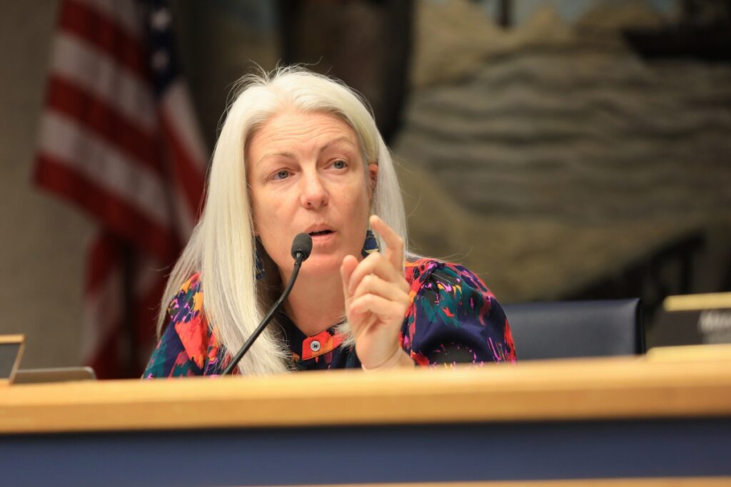 Commissioner Anna Prizzia said Westside Christian School should either connect to both water and wastewater or neither.