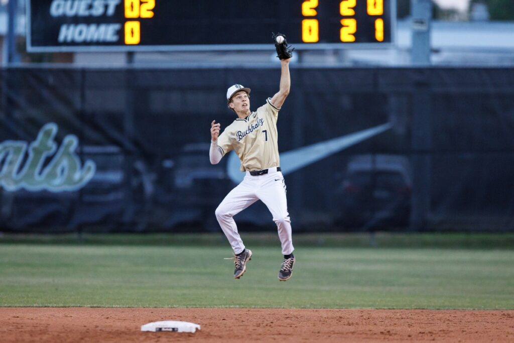 Bobcat second baseman Blake Brewer snags an Oakleaf hit out of the air during Friday's Region 1-6A semifinal at Buchholz High School. 