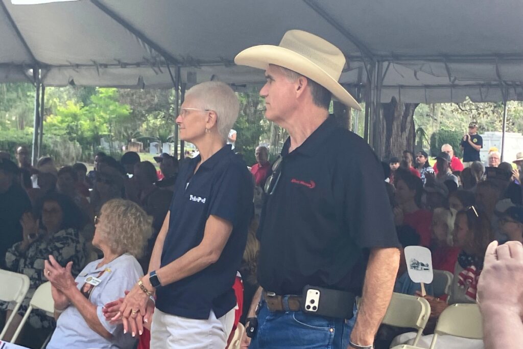 Donna and James Islam watch the Memorial Day ceremony.