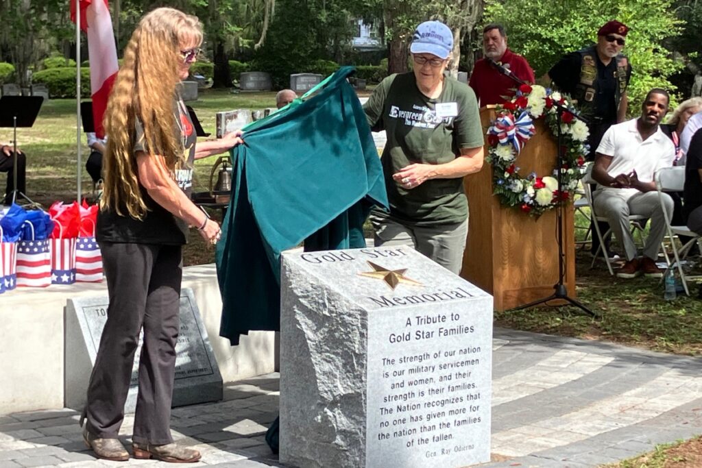 Evergreen Cemetery staff unveil the new Gold Star Memorial for families of soldiers killed in service.