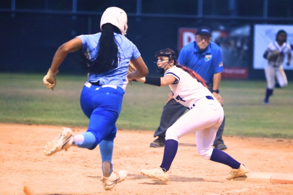Gainesville's Aubree Suarez (7) gets an out at first base in the sixth inning against Deltona in the Class 5A-Region 2 Quarterfinal. Photo by C.J. Gish
