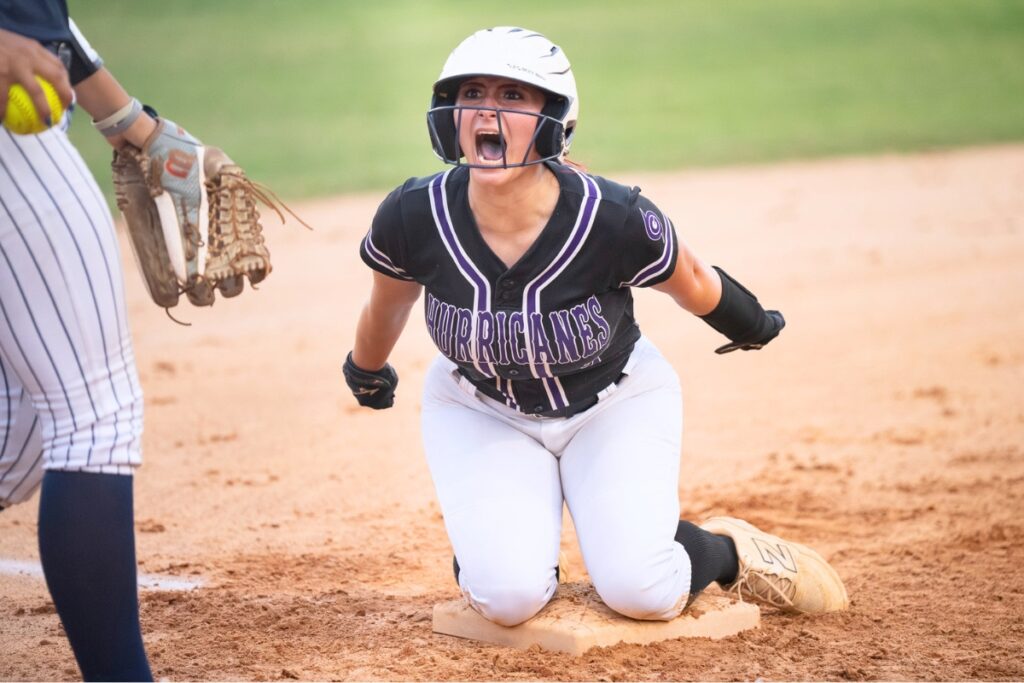 Gainesville's Aubree Suarez (7) slides into third base against Wesley Chapel in the 5A-Region 2 Semifinals. Photo by Tim Rodriquez