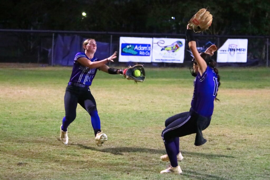 Gainesville's Taylor Rogers (11) catches the third and final out in the top of the seventh inning against Deltona in the 5A-District 5 championship game. Photo by C.J. Gish 1 (1)