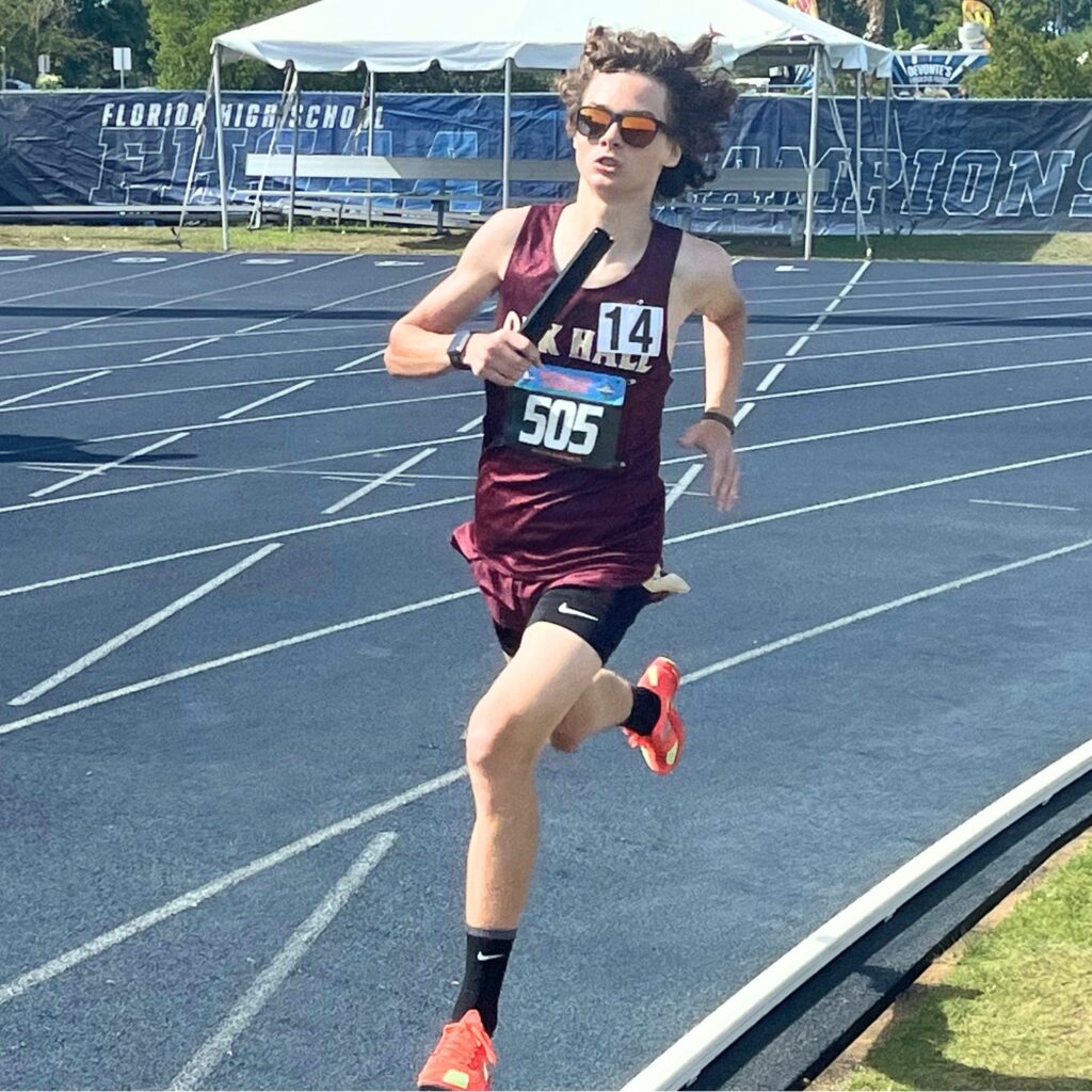Oak Hall freshman Henri Pelletier ran the anchor leg as the Eagles finished second in the 4x800-meter relay. Photo by Mike Ridaught