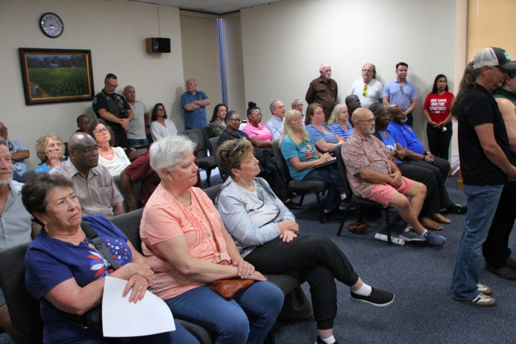 Residents packed into the High Springs Commission Chambers to hear the outcome of the city's police and fire departments. 