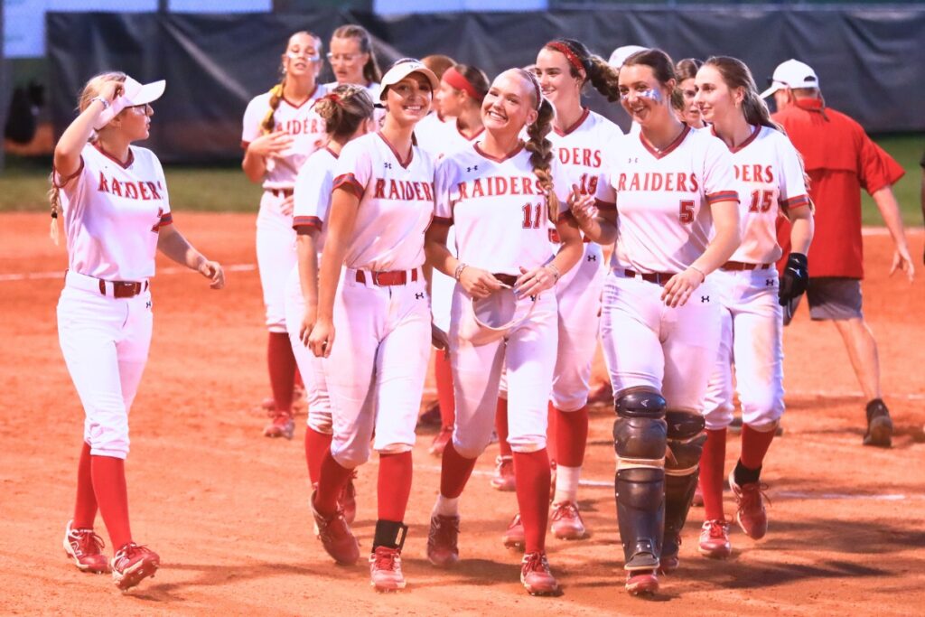 Santa Fe players celebrate after a 10-0 win against Mount Dora in the Class 3A-Region 2 Quarterfinals. Photo by C.J. Gish
