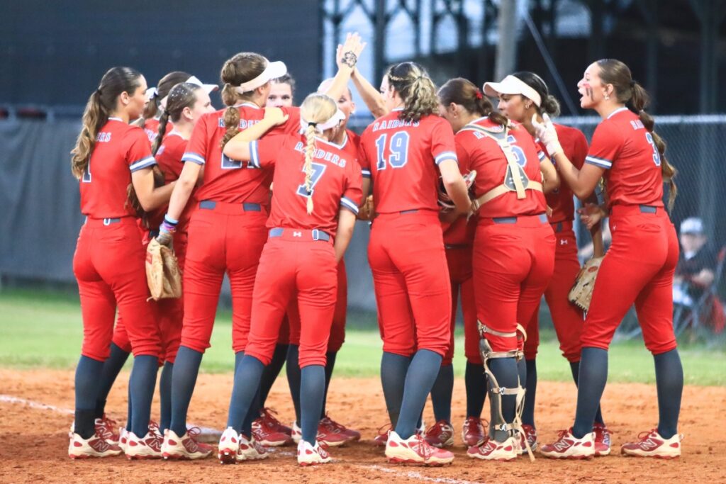 Santa Fe players talk between innings against Eustis in the 3A 3A-Region 2 Final. Photo by C.J. Gish