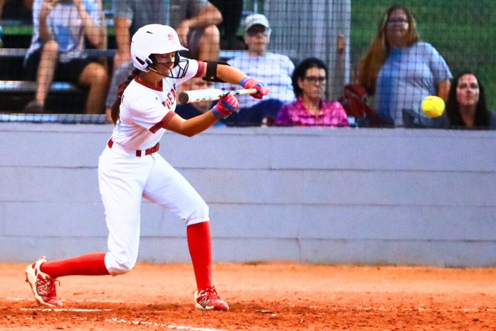 Santa Fe's Corie Wheeler (8) with a sixth-inning bunt against Mount Dora in the Class 3A-Region 2 Quarterfinals. Photo by C.J. Gish