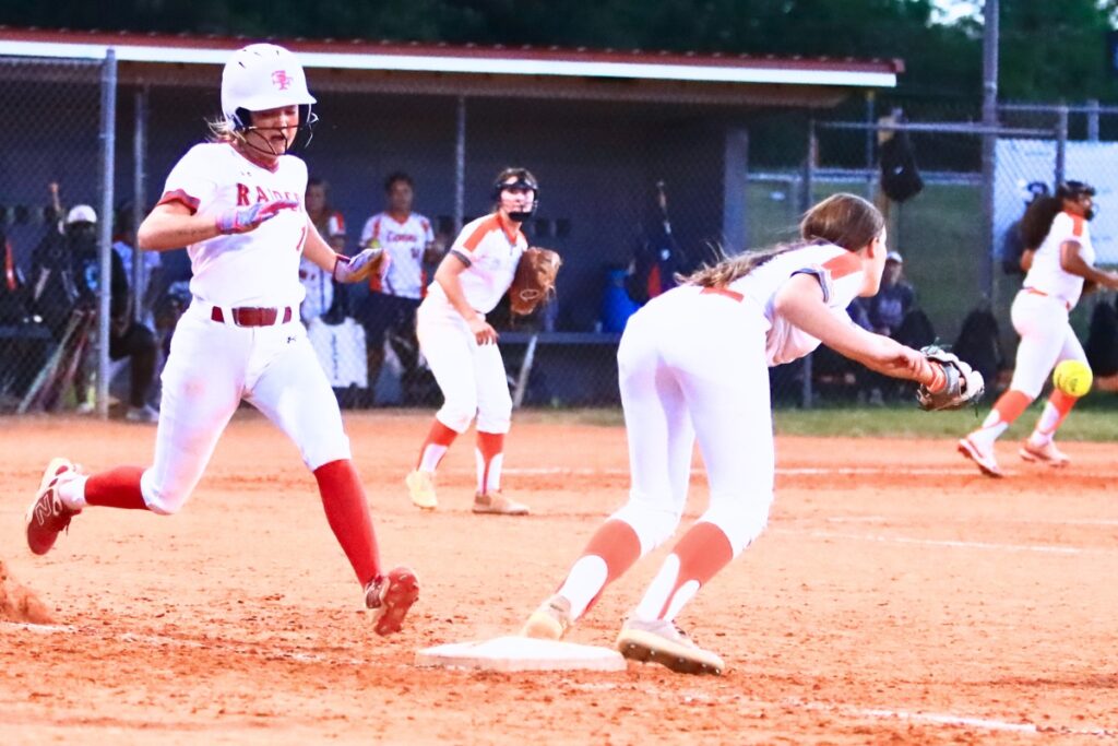 Santa Fe's Juliana Mott (11) beats the throw to first base in the sixth inning against Mount Dora in the Class 3A-Region 2 Quarterfinals. Photo by C.J. Gish