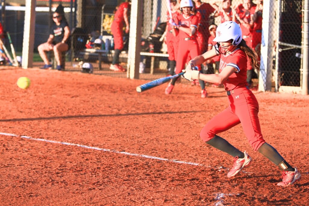 Santa Fe's Maren Hornsby (1) connects for a hit in the third inning against Eustis in the 3A-Region 2 Final. Photo by C.J. Gish