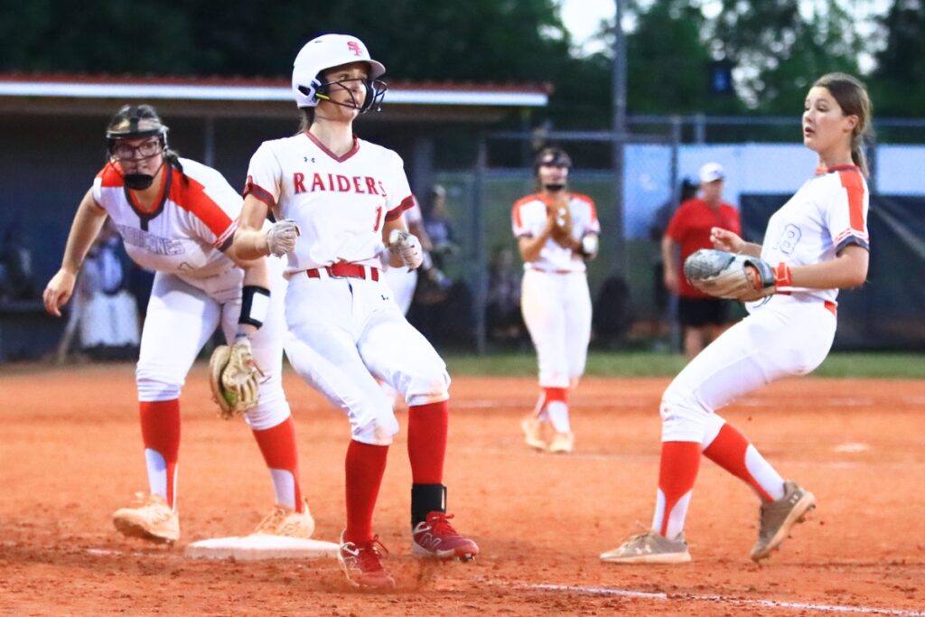 Santa Fe's Maren Hornsby (1) reaches first base in the sixth inning against Mount Dora in the Class 3A-Region 2 Quarterfinals. Photo by C.J. Gish
